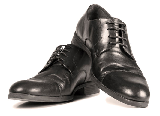 Scarpe nere di pelle